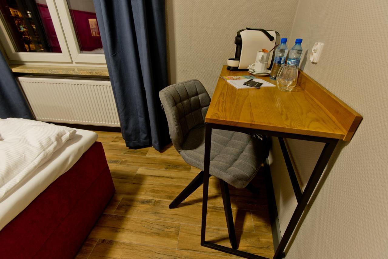 Apartsuites I Sorau Żary Eksteriør bilde A Nespresso machine in a hotel room